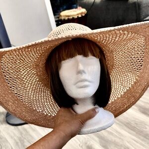 FREE Dillards paper hat very wide brim with a $500 purchase. Runway item